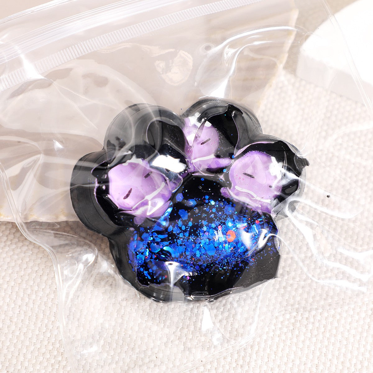 Jucarie Antistres Squishy, selexmo, cu Revenire Lenta, Squeeze Pinch Family, Model Cat Paw, 6.5 x 6 cm, din Tpr, 4-6 Ani, Model 5 Meduze, Negru cu Insertii