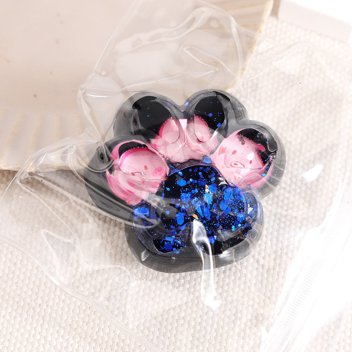 Jucarie Antistres Squishy, selexmo, cu Revenire Lenta, Squeeze Pinch Family, Model Cat Paw, 6.5 x 6 cm, din Tpr, 4-6 Ani, Model 5 Meduze, Negru cu Insertii