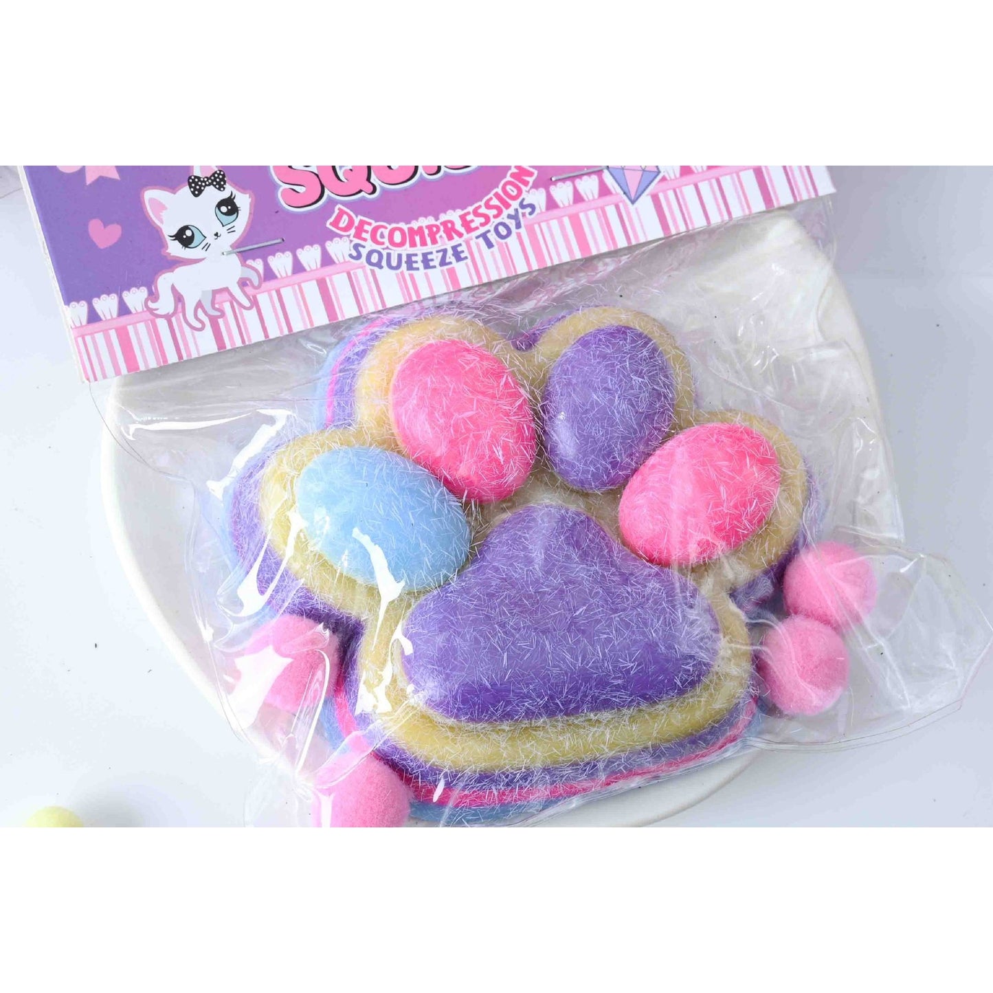 Jucarie Antistres Squishy, selexmo, cu Revenire Lenta, Model Labuta de Pisica Pufoasa, 12.5x10.5 cm, 220g, Squeeze Pinch Family, Ambalaj Transparent, Mov-Multicolor