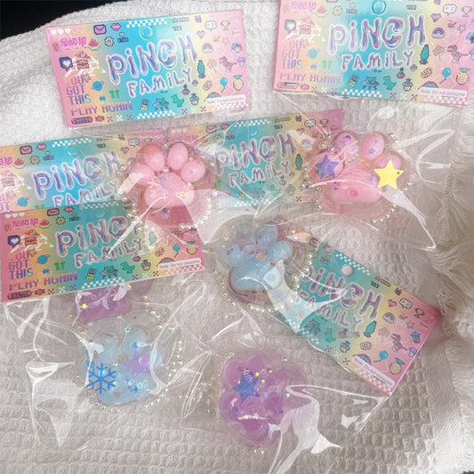 Jucarie Antistres Squishy, selexmo, cu Revenire Lenta, Squeeze Pinch Family, Model Labuta de Pisica, 6x5.5 cm, 70g, Ambalaj Transparent, Roz-Transparent