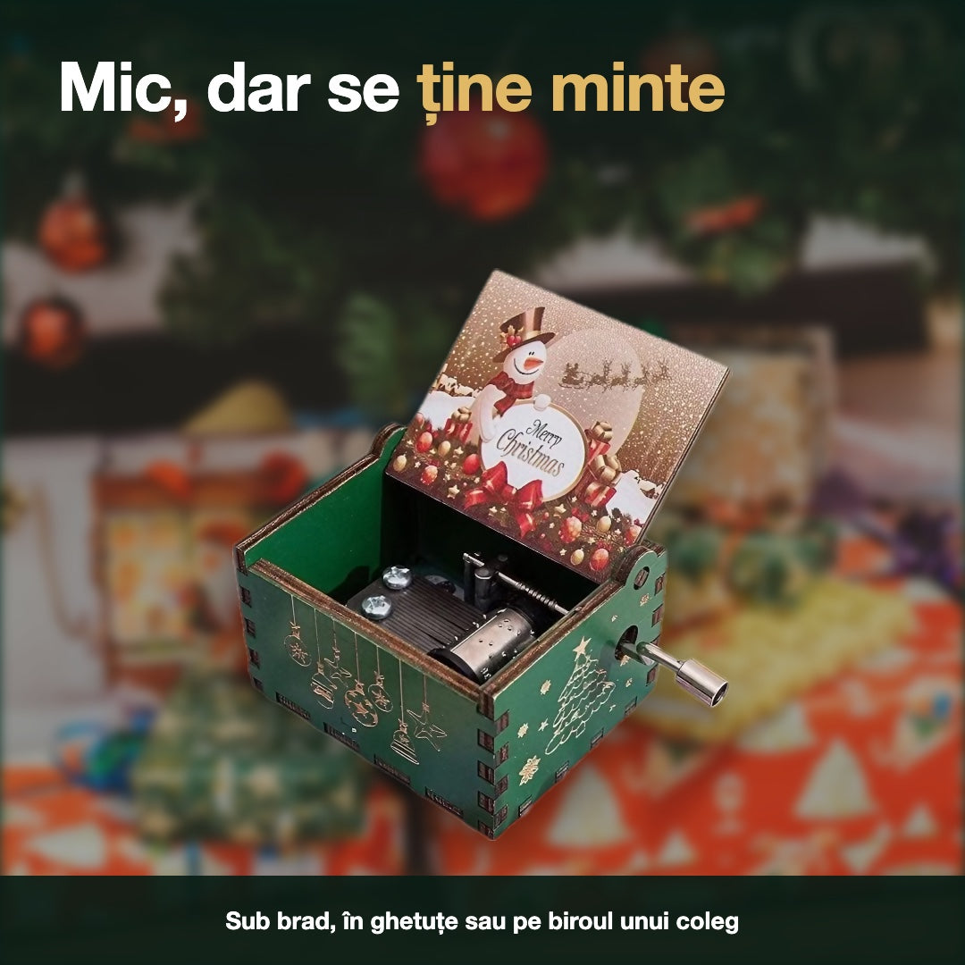 Cutia muzicală printre cadouri, sub brad