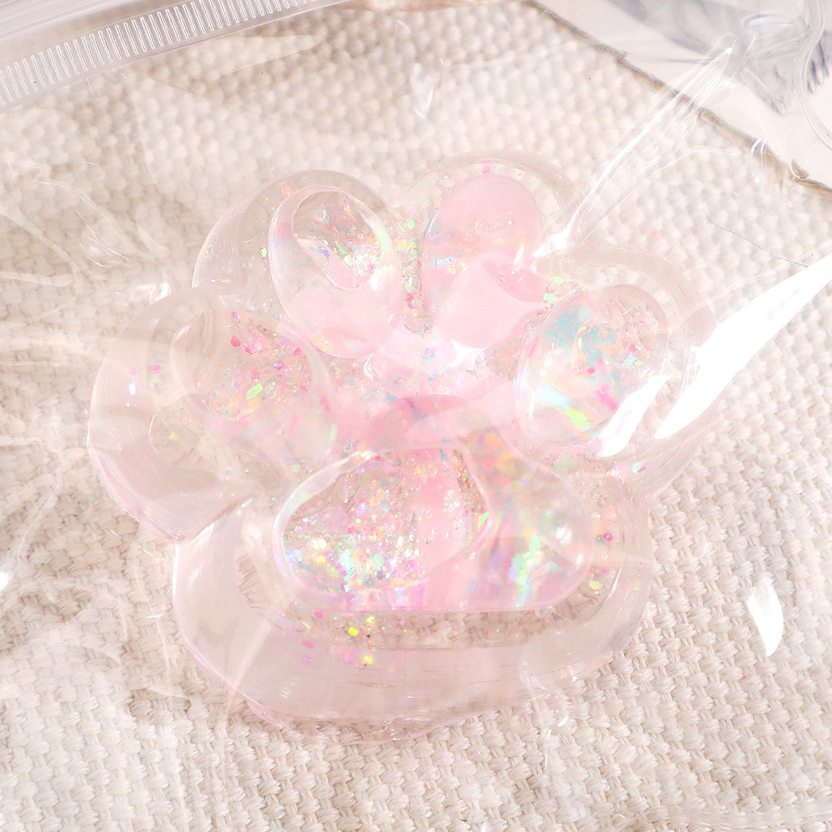 Jucarie Antistres Squishy, selexmo, cu Revenire Lenta, Squeeze Pinch Family, Model Cat Paw, 6.5 x 7 cm, din Tpr, 4-6 Ani, Model 2 Flori, Transparent