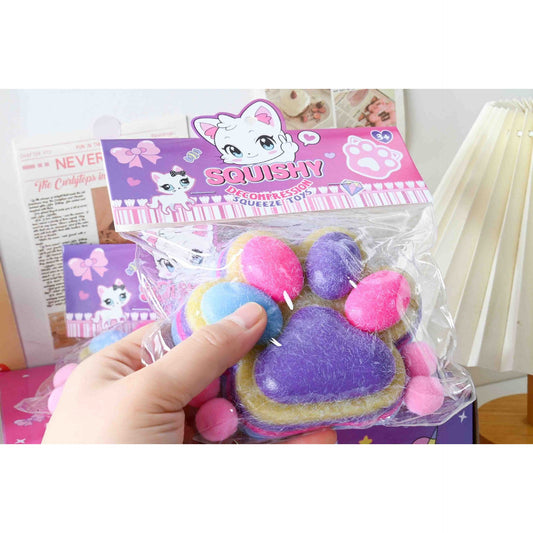Jucarie Antistres Squishy, selexmo, cu Revenire Lenta, Model Labuta de Pisica Pufoasa, 12.5x10.5 cm, 220g, Squeeze Pinch Family, Ambalaj Transparent, Mov-Multicolor