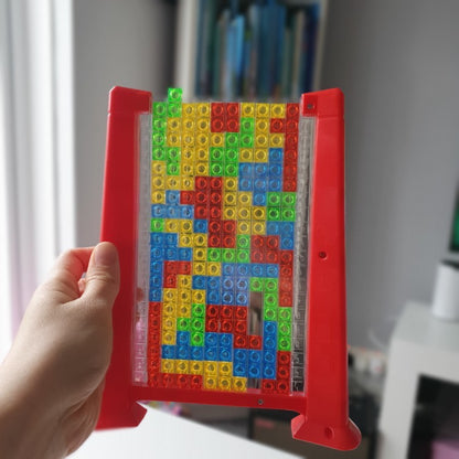 Joc de inteligenta Tetris puzzle tangram, 70 de piese multicolore, 3D, montessori, interactiv, din plastic, zar inclus, sac depozitare piese, varsta peste 6 ani
