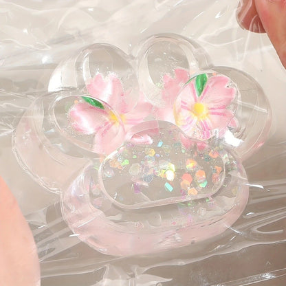 Jucarie Antistres Squishy, selexmo, Labuta de Pisica Pufoasa, cu Revenire Lenta, 7 x 6.5 cm, Model Flori 2, Transparent