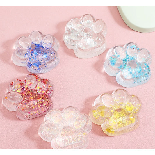 Jucarie Antistres Squishy, selexmo, cu Revenire Lenta, Squeeze Pinch Family, Model Cat Paw, 6.5 x 7 cm, din Tpr, 4-6 Ani, Model 4 Sclipici, Transparent