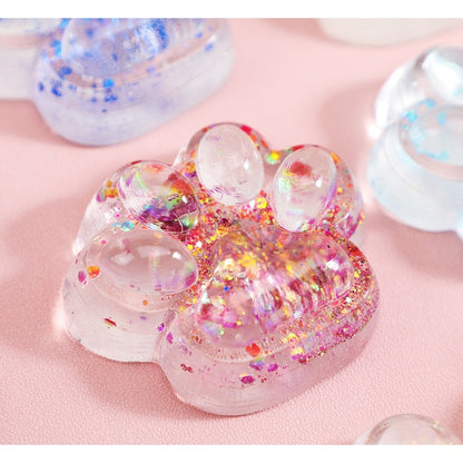 Jucarie Antistres Squishy, selexmo, cu Revenire Lenta, Squeeze Pinch Family, Model Cat Paw, 6.5 x 7 cm, din Tpr, 4-6 Ani, Model 4 Sclipici, Transparent