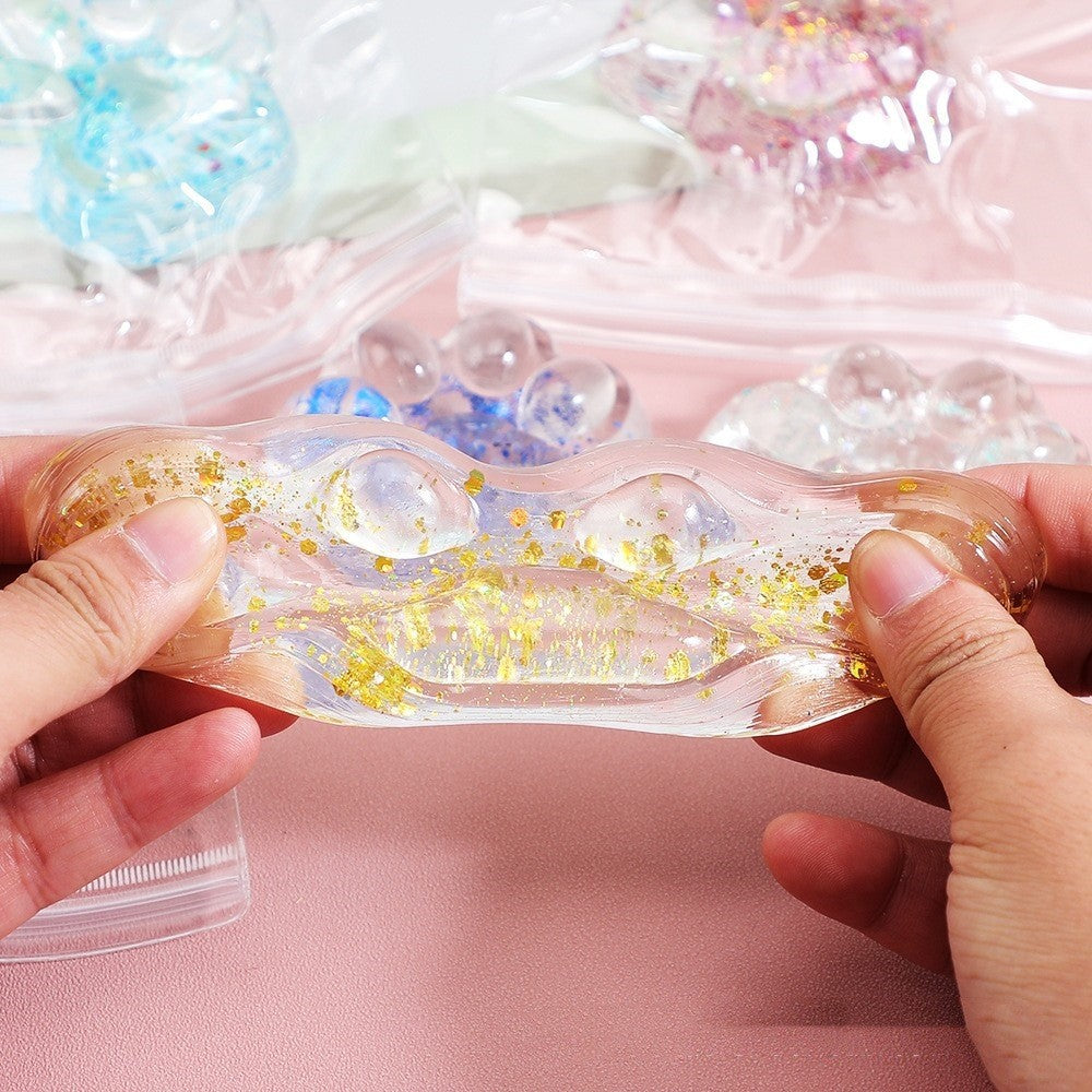 Jucarie Antistres Squishy, selexmo, cu Revenire Lenta, Squeeze Pinch Family, Model Cat Paw, 6.5 x 7 cm, din Tpr, 4-6 Ani, Model 4 Sclipici, Transparent