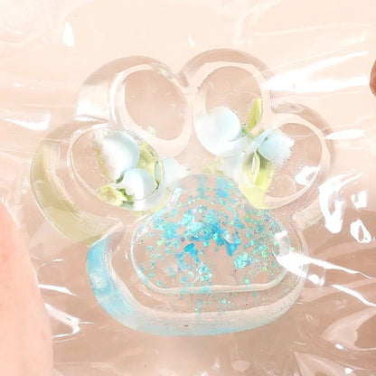 Jucarie Antistres Squishy, selexmo, Labuta de Pisica Pufoasa, cu Revenire Lenta, 7 x 6.5 cm, Model Flori 1, Transparent