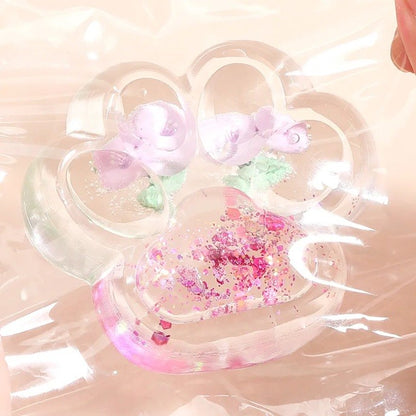 Jucarie Antistres Squishy, selexmo, Labuta de Pisica Pufoasa, cu Revenire Lenta, 7 x 6.5 cm, Model Flori 1, Transparent