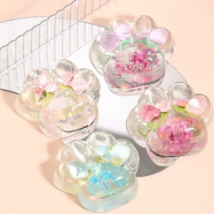 Jucarie Antistres Squishy, selexmo, Labuta de Pisica Pufoasa, cu Revenire Lenta, 7 x 6.5 cm, Model Flori 1, Transparent