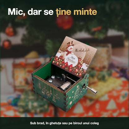 Cutia muzicală printre cadouri, sub brad